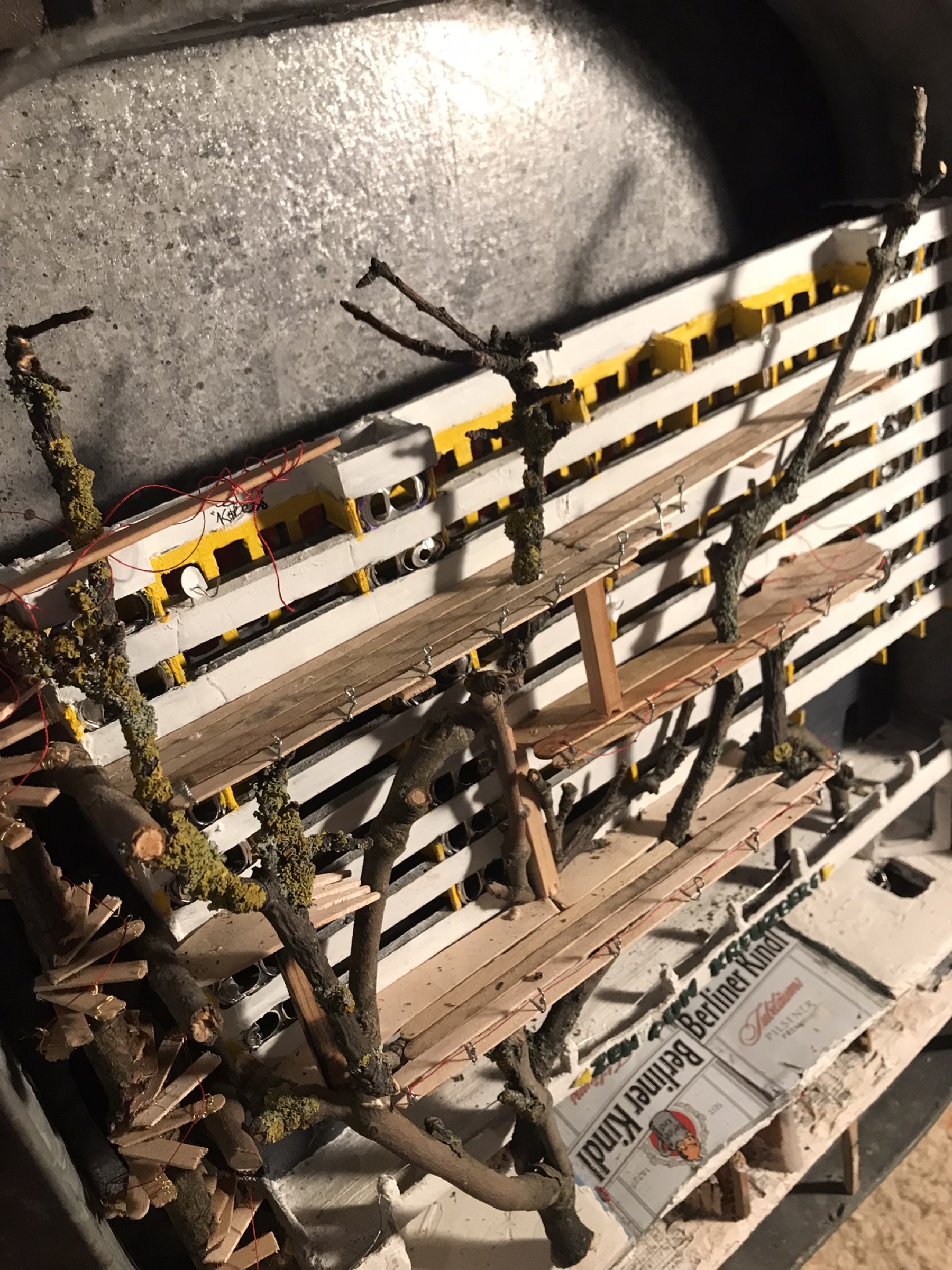 Wooden café sticks being added to the façade