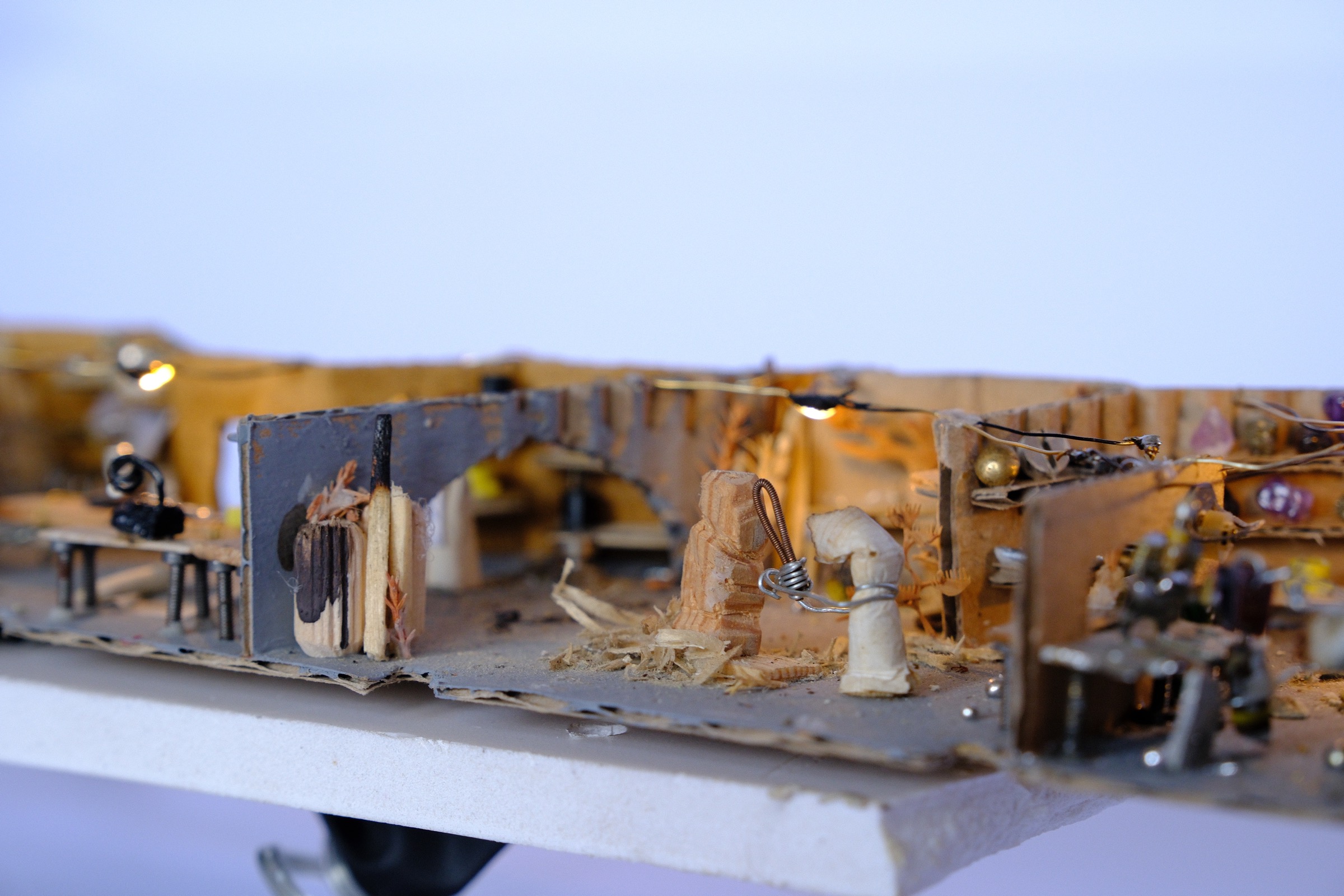 Close up of a cigarette figure working with wood