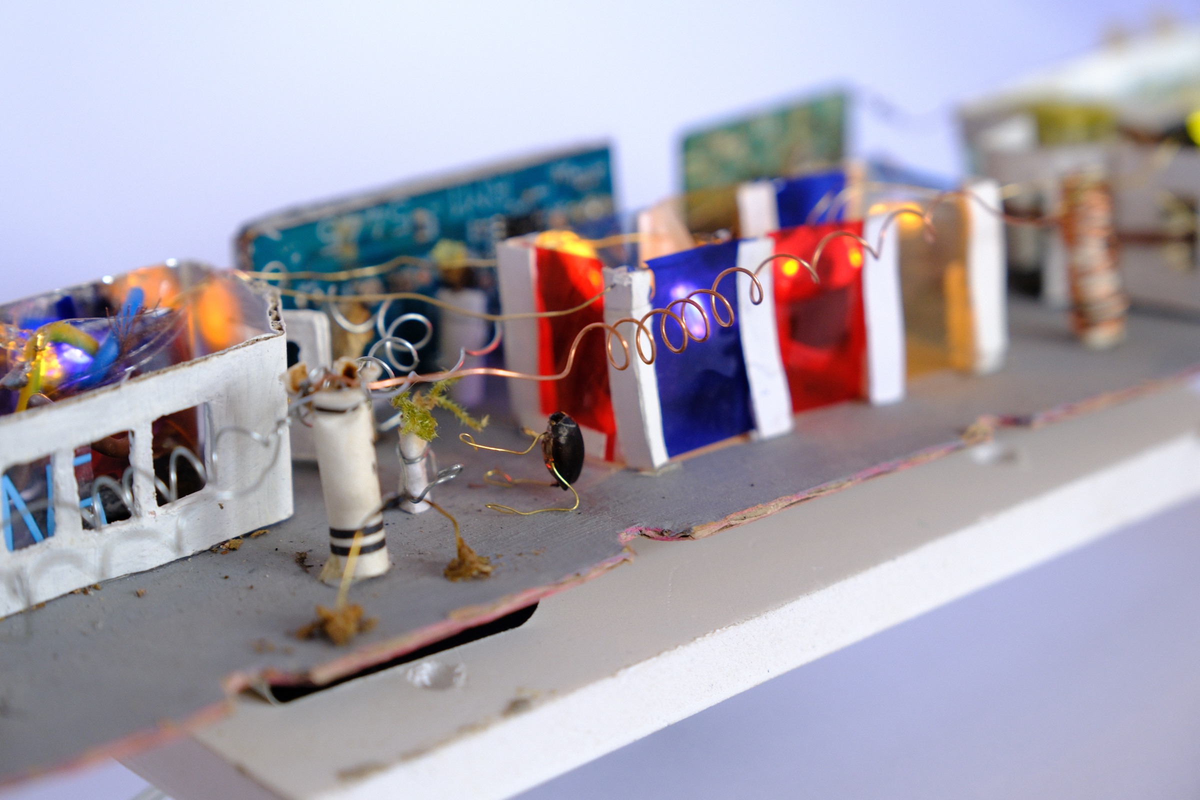 Insect creature organising the miniature light workshop
